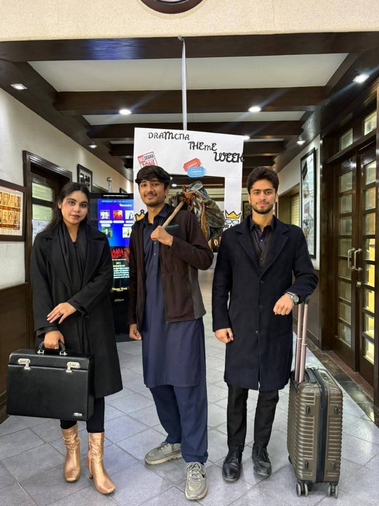Theme Week 2026 students with luggage theme